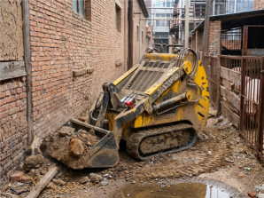 Skid steer loader operating in narrow aisle