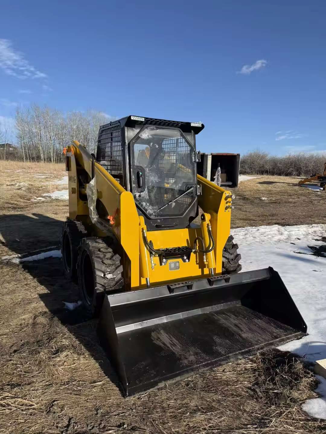 LT100 skid steer loader at customer site